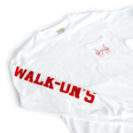 white long sleeve pocket t-shirt with red Walk-On's down the right sleeve and red WIN hand sign on the pocket