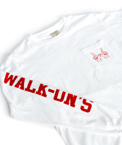 white long sleeve pocket t-shirt with red Walk-On's down the right sleeve and red WIN hand sign on the pocket